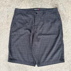 Vintage Y2K Quiksilver Men's Black Plaid Hybrid Skater Style Shorts